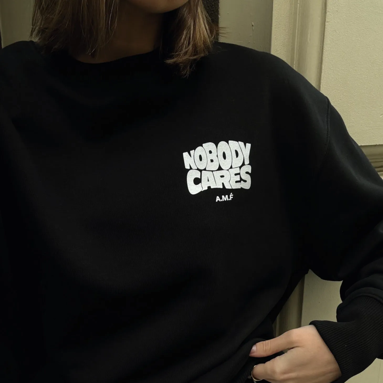 NOBODY CARES Sweater